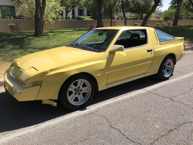 1989 Yellow Chrysler Conquest Hatchback