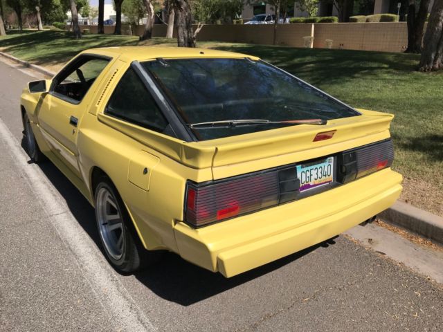 1989 Yellow Chrysler Conquest Hatchback