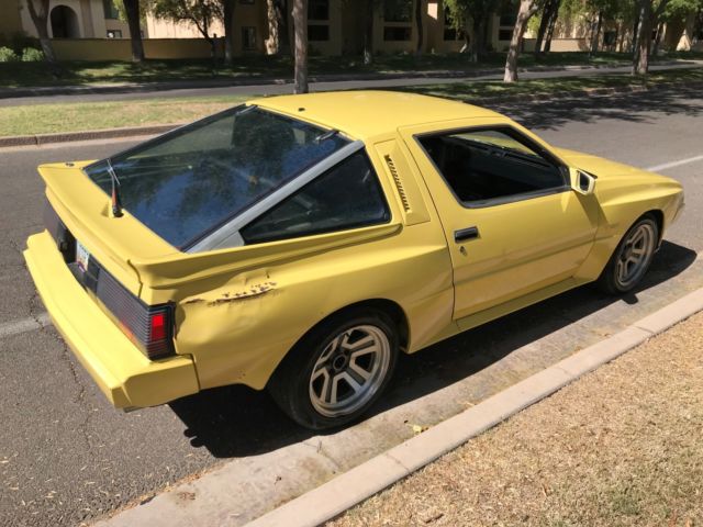 1989 Yellow Chrysler Conquest Hatchback