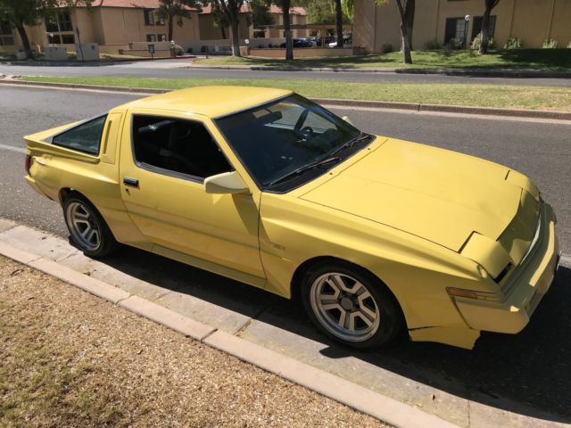 1989 Yellow Chrysler Conquest Hatchback