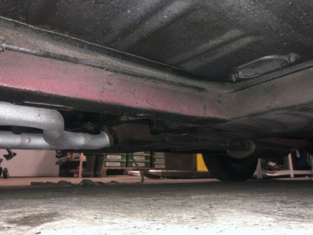 1967 burgundy Ford Mustang convertible