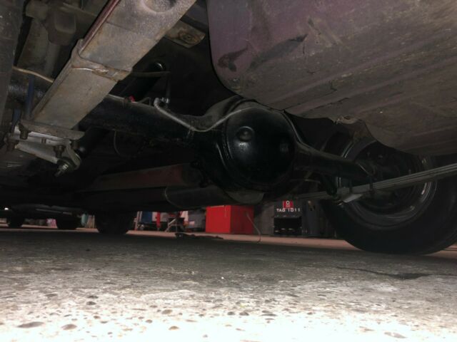 1967 burgundy Ford Mustang convertible