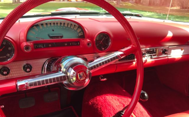1955 Red Ford Thunderbird Convertible With Hard Top