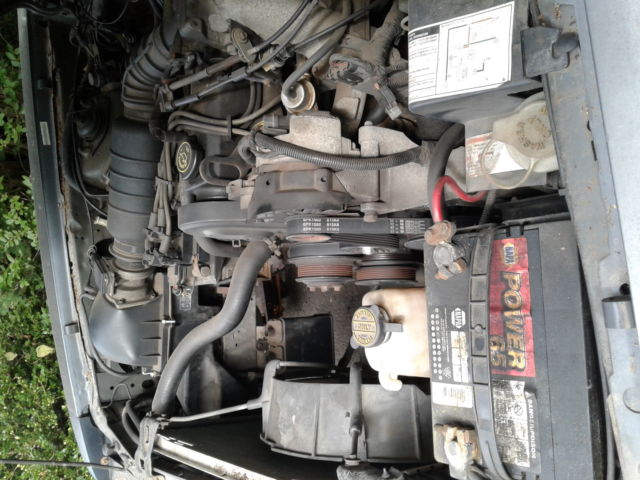 1992 gray Ford Mustang Convertible