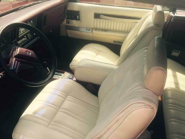 1984 Burgundy Chrysler LeBaron Convertible