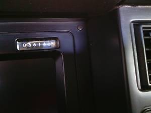 1987 dark red Chevrolet Corvette Convertible