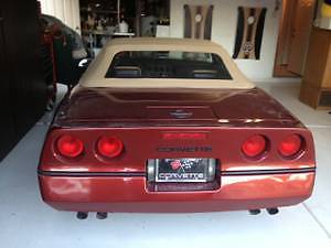 1987 dark red Chevrolet Corvette Convertible