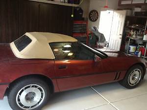 1987 dark red Chevrolet Corvette Convertible