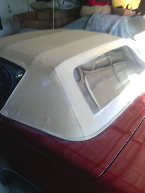 1987 dark red Chevrolet Corvette Convertible