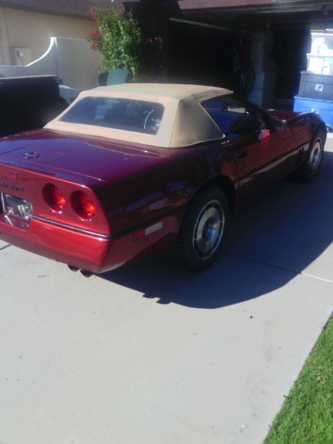 1987 dark red Chevrolet Corvette Convertible