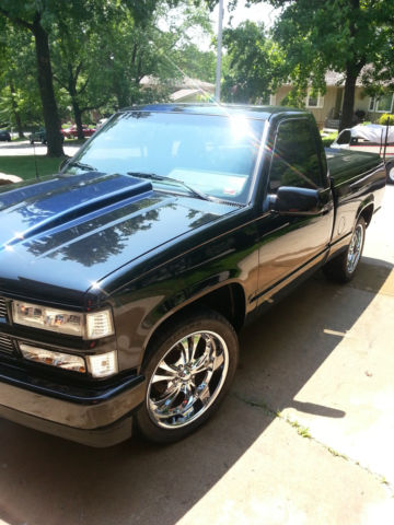 1989 black and blue GMC Sierra 1500