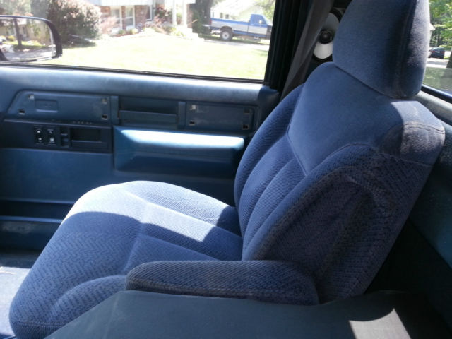 1989 black and blue GMC Sierra 1500