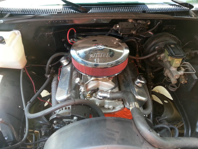 1989 black and blue GMC Sierra 1500