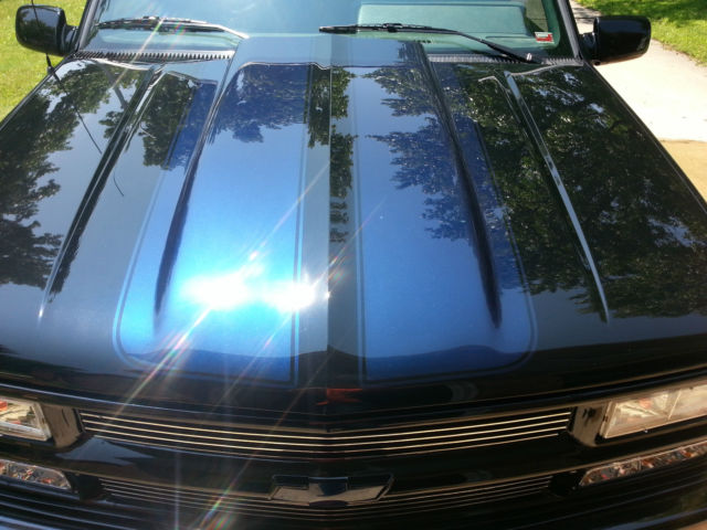 1989 black and blue GMC Sierra 1500