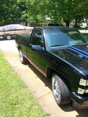 1989 black and blue GMC Sierra 1500