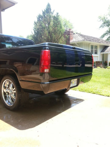 1989 black and blue GMC Sierra 1500
