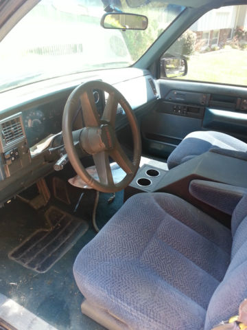 1989 black and blue GMC Sierra 1500