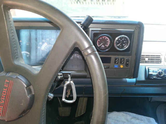 1989 black and blue GMC Sierra 1500