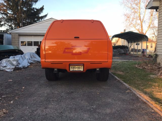 1987 orange pearl metallic Chevrolet S-10 2dr