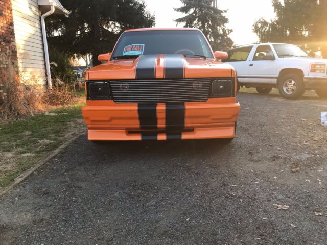 1987 orange pearl metallic Chevrolet S-10 2dr