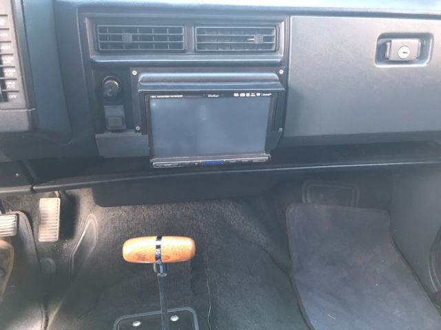 1987 orange pearl metallic Chevrolet S-10 2dr