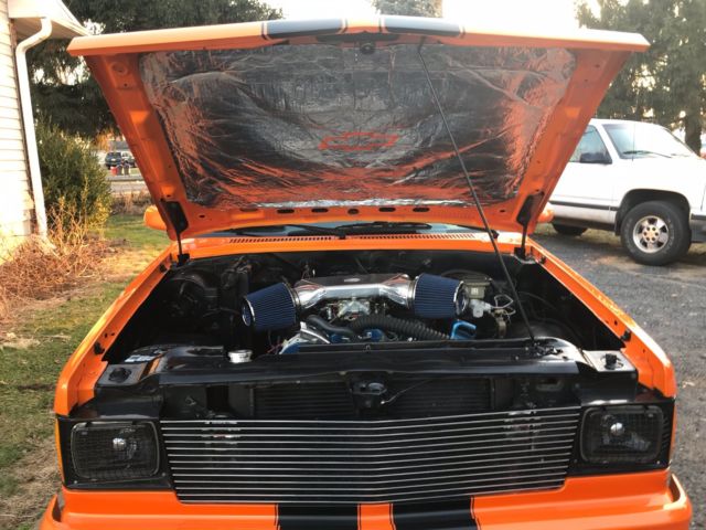 1987 orange pearl metallic Chevrolet S-10 2dr
