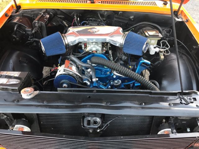 1987 orange pearl metallic Chevrolet S-10 2dr