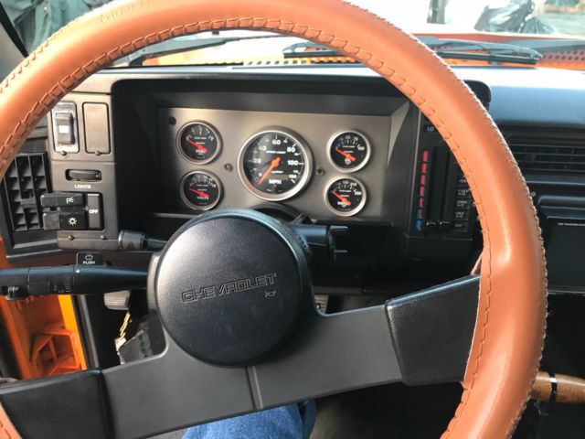 1987 orange pearl metallic Chevrolet S-10 2dr