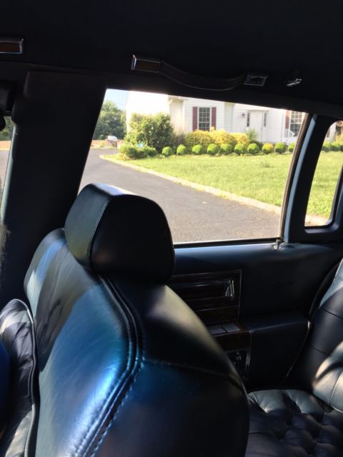 1991 Blue Cadillac Brougham Sedan