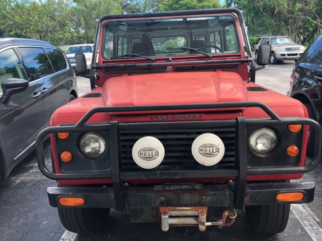 1994 Red Land Rover Defender SUV