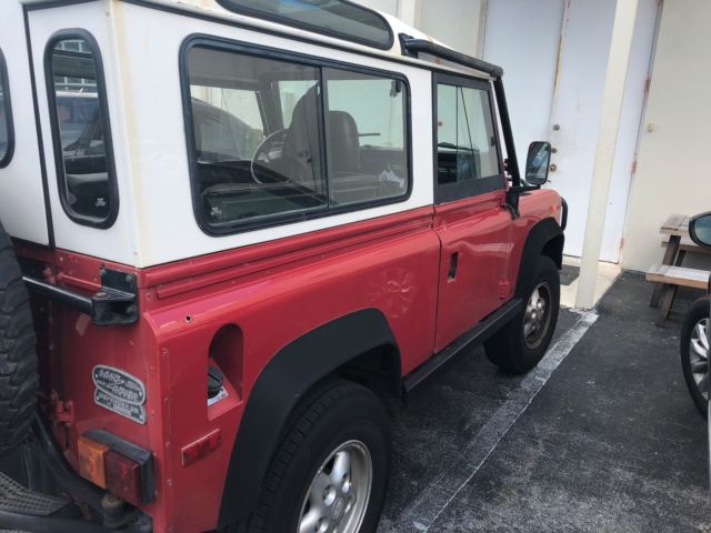 1994 Red Land Rover Defender SUV