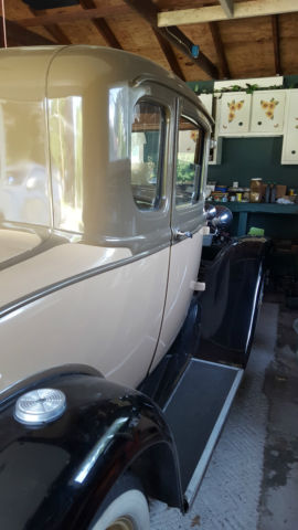 1931 Beige and Light Brown Ford Model A 2 door coupe