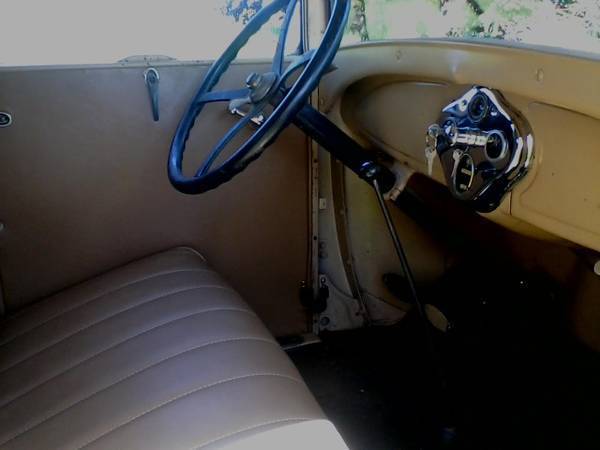 1928 Tan-Black Ford Model A Coupe