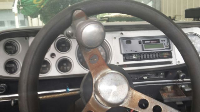 1977 red primer Dodge Power Wagon pickup