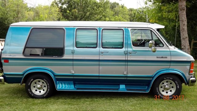 1992 silver and teal Dodge Ram Van Standard Passenger Van