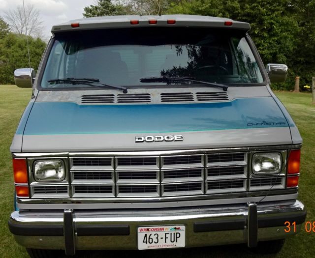 1992 silver and teal Dodge Ram Van Standard Passenger Van