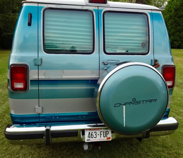 1992 silver and teal Dodge Ram Van Standard Passenger Van