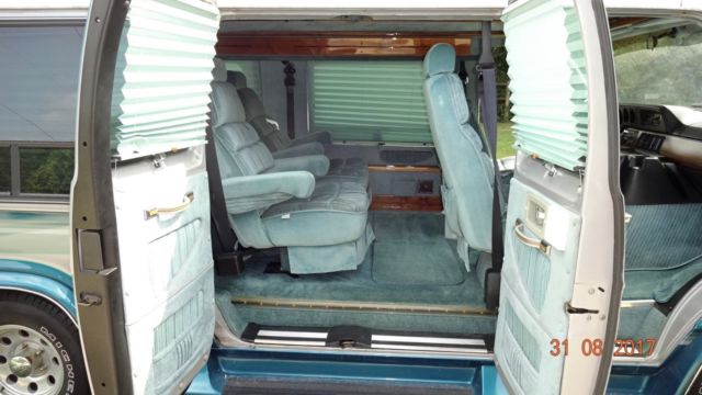 1992 silver and teal Dodge Ram Van Standard Passenger Van