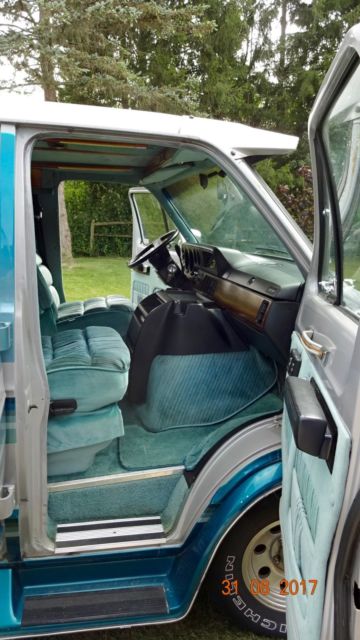 1992 silver and teal Dodge Ram Van Standard Passenger Van
