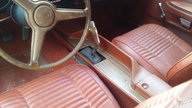 1970 burnt orange Dodge Challenger