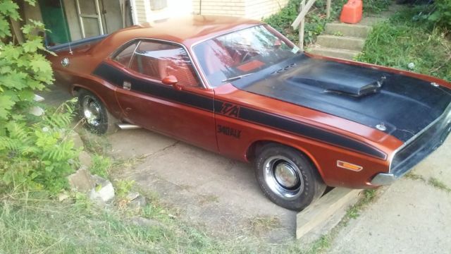 1970 burnt orange Dodge Challenger