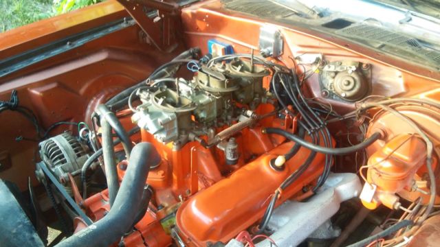 1970 burnt orange Dodge Challenger