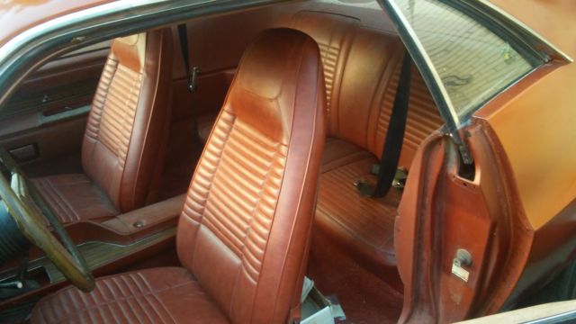 1970 burnt orange Dodge Challenger