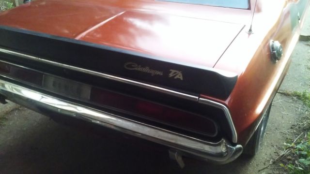 1970 burnt orange Dodge Challenger