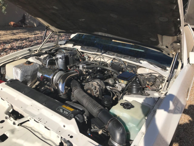 1989 White Pontiac Firebird Coupe