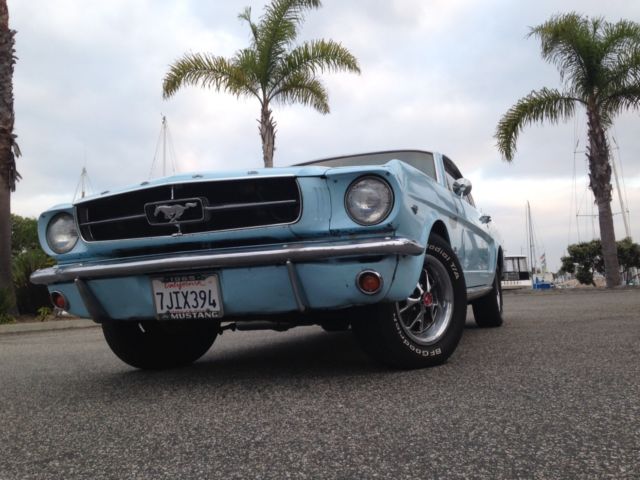 1965 blue Ford Mustang Fastback