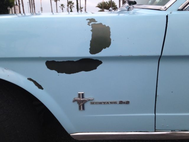 1965 blue Ford Mustang Fastback