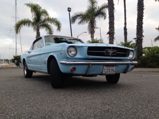 1965 blue Ford Mustang Fastback
