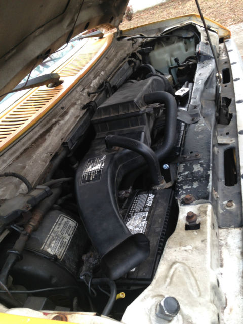 1991 Orange / White Ford E-Series Van Extended Passenger Van