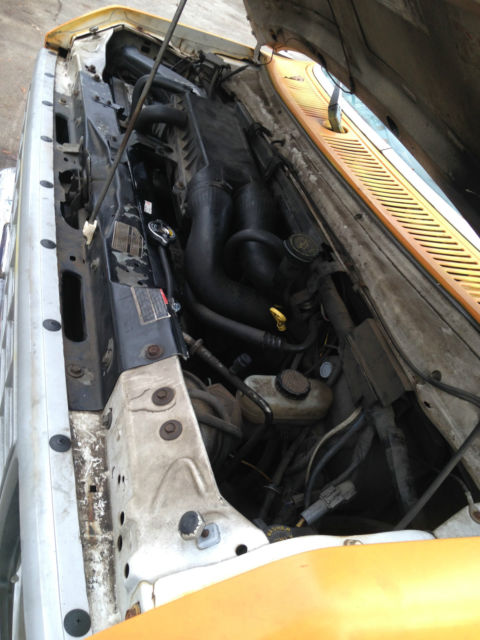 1991 Orange / White Ford E-Series Van Extended Passenger Van